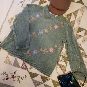 Seafoam green knit sweater with embroidered flowers
